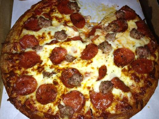 Large pizza with extra cheese, sausage and pepperoni