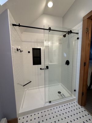 Our most famous style! Black fixtures with a white wall system.