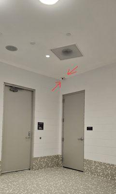 Cameras pointing to Lockers in family  changing area.