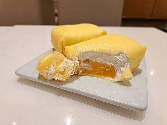 P1: Mango Fluffy Pillow Cake order comes with two. So heavenly! Half a mango and whip cream wrapped in a mango crepe.