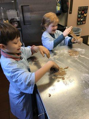 Learning to make communion bread.