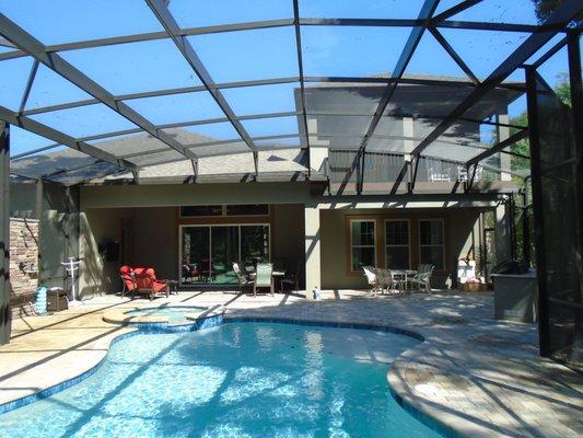 The best way to enjoy Florida weather (BUG FREE) Put a Screen cage over your pool !!!