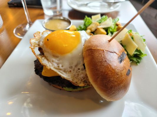 My wife's burger with a Caesar salad