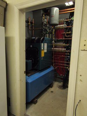 Oil boiler upgrade. Burnham MPO sitting on a Buderus horizontal water heater and all new manifolds, smart pumps and zone controls.