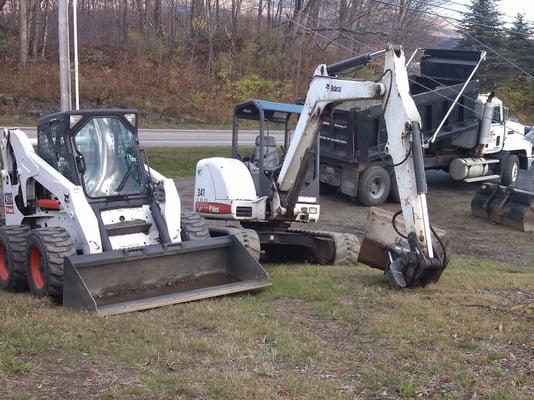 Just some of our equipment:  Bobcat Skid Steer & Bobcat Mini Excavator.