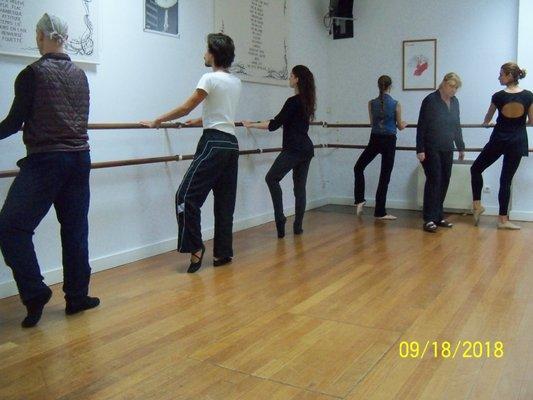 Teachers  trying steps at the Barre during teacher's course.