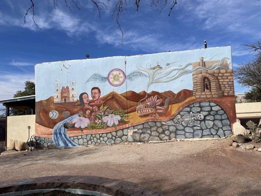 Another historical mural by the wishing shrine