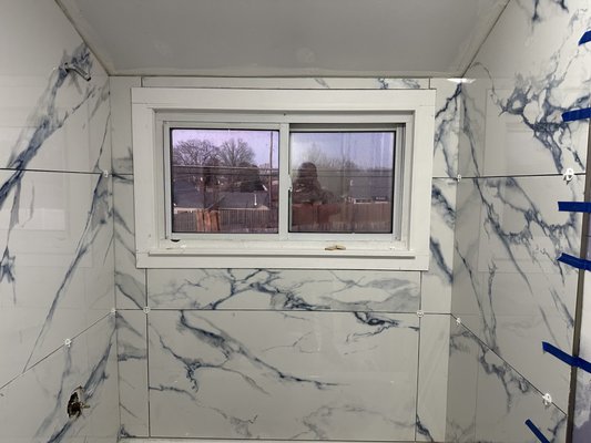 New frame and tile in the upstairs Levittown bathroom.