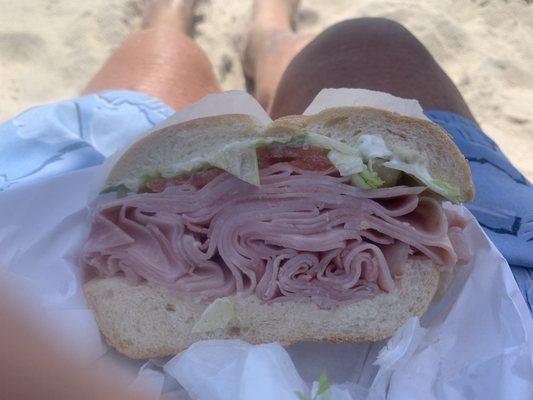 Ham Sandwich at the beach on my soon to be toasty brown legs. Don't spill the mayo!