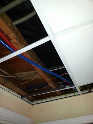 Work on repiping a customer's home.