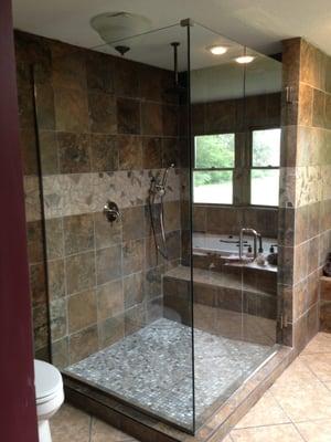 Frameless European shower enclosure