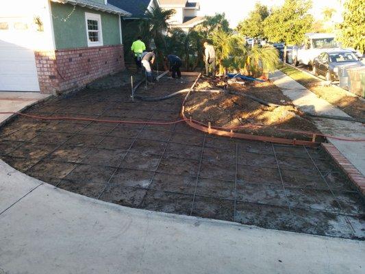 Starting the pour of the driveway expansion