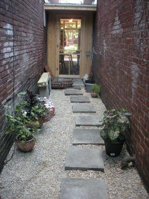 back alley view of the Nook from soon to be Sculpture Garden