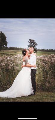 Wedding Bride and groom in a field