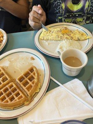 Cornbeef hash omelette with a side of grits