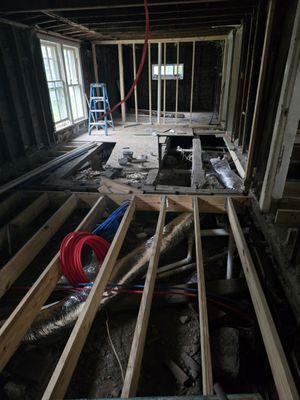 Running HVAC under the crawlspace.  So creative!