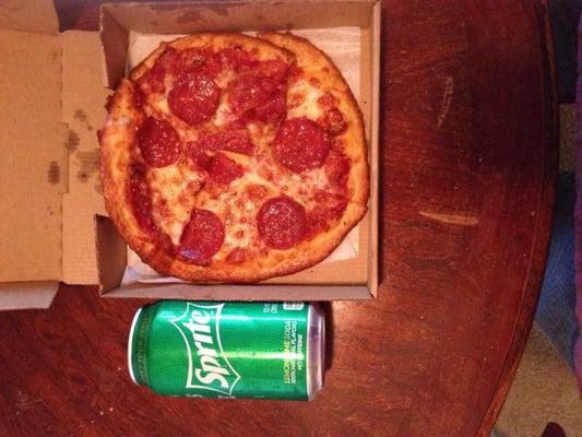 7 inch personal pizza, can of soda for scale