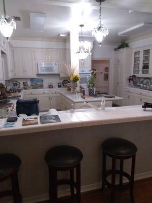 Kitchen remodel. Added cabinets & repainted.