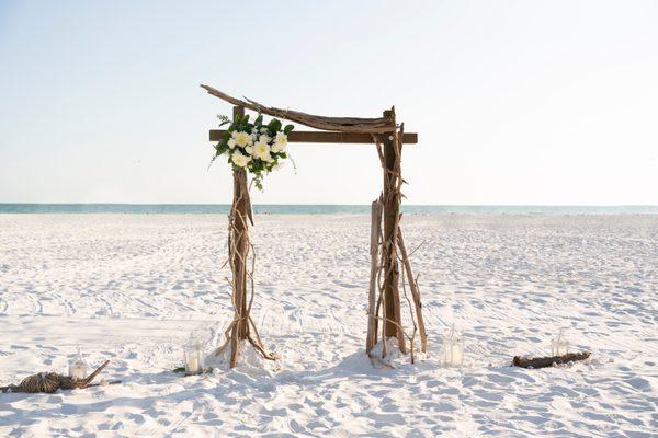 Natural driftwood arch on Siesta Key beach in Sarasota Florida.