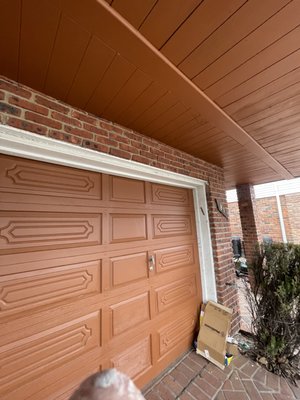 Exterior Wood House Staining Which Includes Deck staining, and Garage Door Staining.