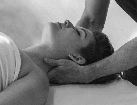 Preparing for a neck stretch after working on the anterior and posterior muscles of the neck and upper body.