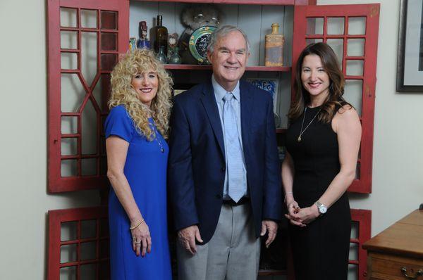 From left, Paralegal Linda DeMatteis, Partner Joseph Garrison, and Partner Amanda DeMatteis.