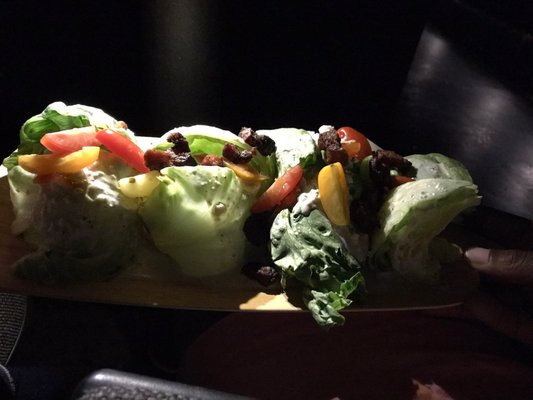 Incredibly difficult salad to eat in the dark. Tasty but not doable in a theater.