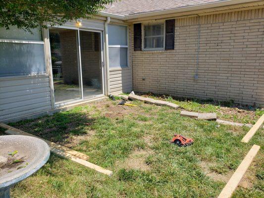 Before concrete pad and sun shade