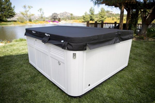 Sundance 880 Series hot tub with cover at Big Sky Spas