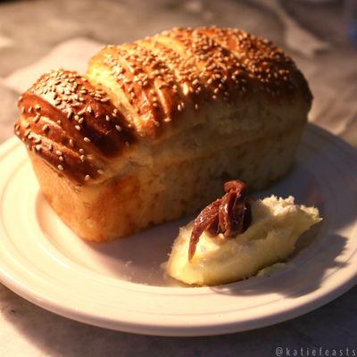 Sesame brioche, butter & anchovies