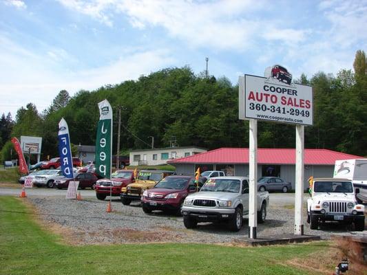 Cooper Auto Sales on highway 525 right next to Dairy Queen in Clinton, WA.
  We buy, sell, rent, and consign vehicles