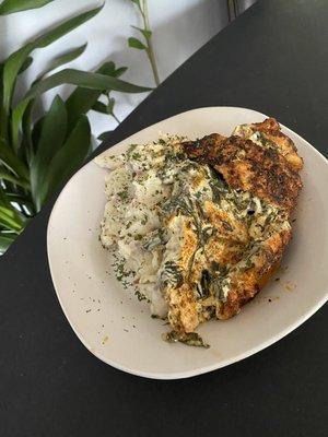 Stuffed chicken with spinach and cheese with smashed potatoes