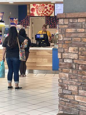 Awful employee chatting it up with the woman in front of the line to the point where people were just walking away from the line