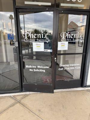 Inside Phenix Salon, just call her and she opens the door for you when you arrive