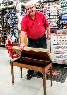 Store Manager with my beautifully repaired piano bench(!)