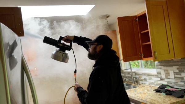 Fogging to get rid of cigarette smoke odors.