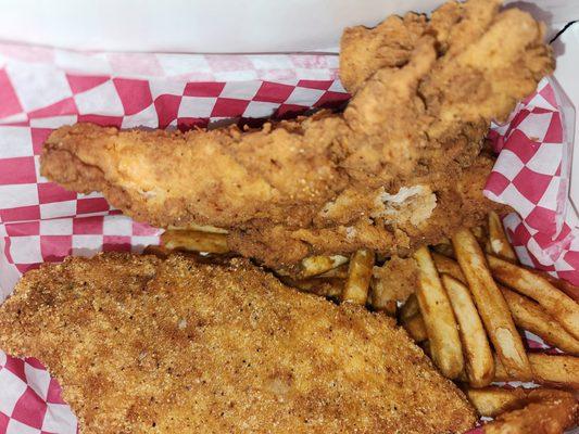 This is the 'Pick 2' fried combo where I chose fried catfish and chicken tenders with Cajun fries.