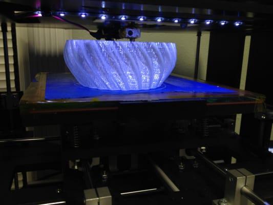 3D printer creating a 5"x5"X3" bowl. 12 hours to make the bowl. Resolution is 50 microns.