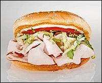 Walt's Roast Turkey sandwich - turkey with stuffing, cranberry sauce, mayo & lettuce on a large grilled roll