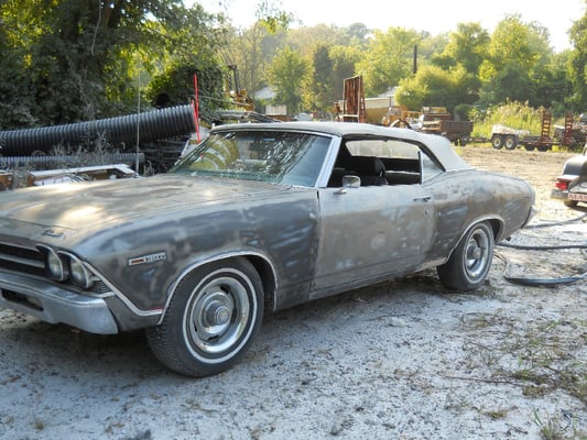 The paint was removed from this classic car for a restoration project