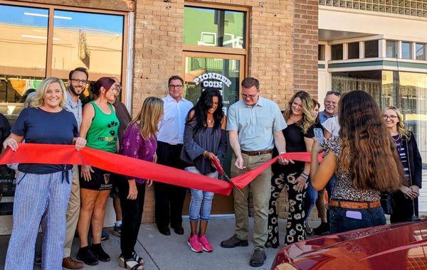 Owners Keri & Chris cutting the ceremonial ribbon.