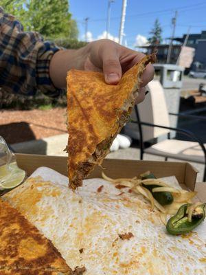 Birria Pizza  consomé, limes, salsas and jalapeños included