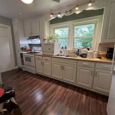 Cabinet refresh!  We replaced the doors and drawers and repainted these cabinets in Greenville SC.