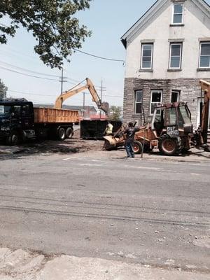 A leveling and compacting the ground for parking