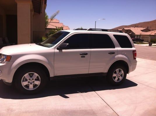 2012 Ford Escape with 17% tint all around and a limo window strip