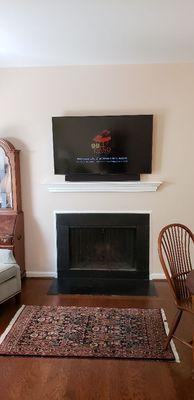 TV Mounting above Fireplace... Cords Concealed in wall w/new Electrical Outlet
- pic 3