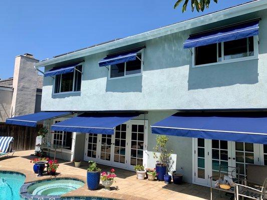 Sunbrella fabric awnings redone - beautiful work.