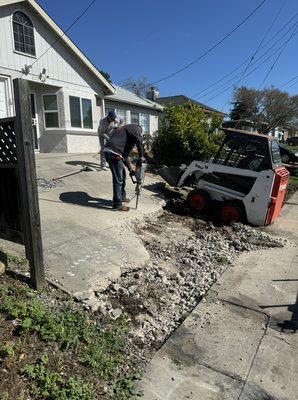 Concrete demo. Getting rid of old concrete to add new extension and steps