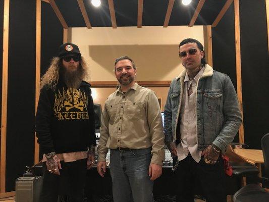 Rapper Yelawolf (right) with his DJ (left) and engineer Michael Harmon in the studio. Can you guess which one is the engineer?