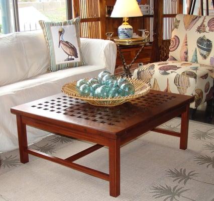 Coffee table made using an authentic teak ship's hatch cover. From Skipjack's custom nautical furniture.